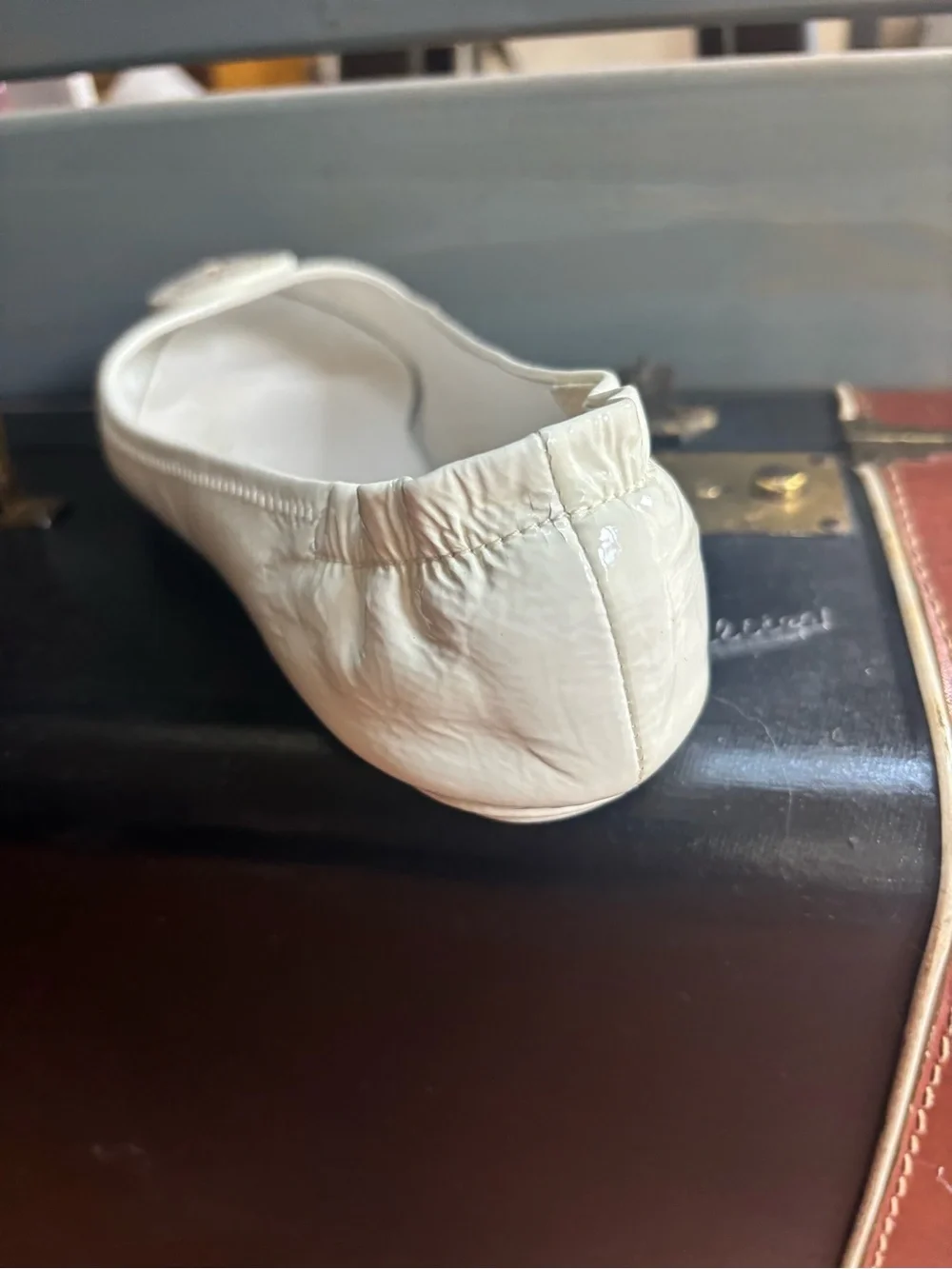 White Ballet Flats with Logo Medallion